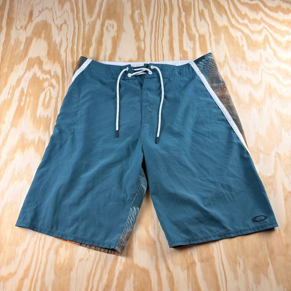 Y2K Oakley Mens Board Shorts Size 32 Teal Blue Orange Abstract Swim Trunks